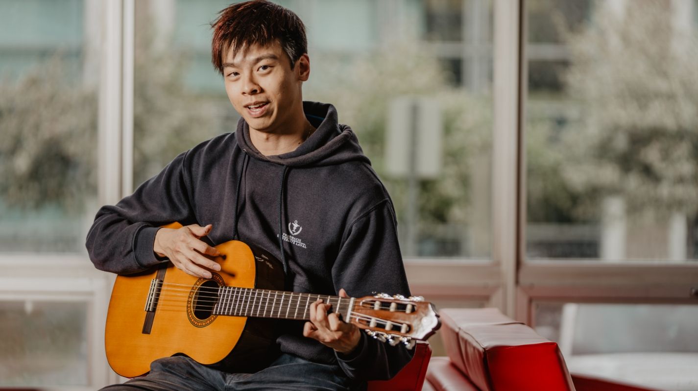  Student playing guitar